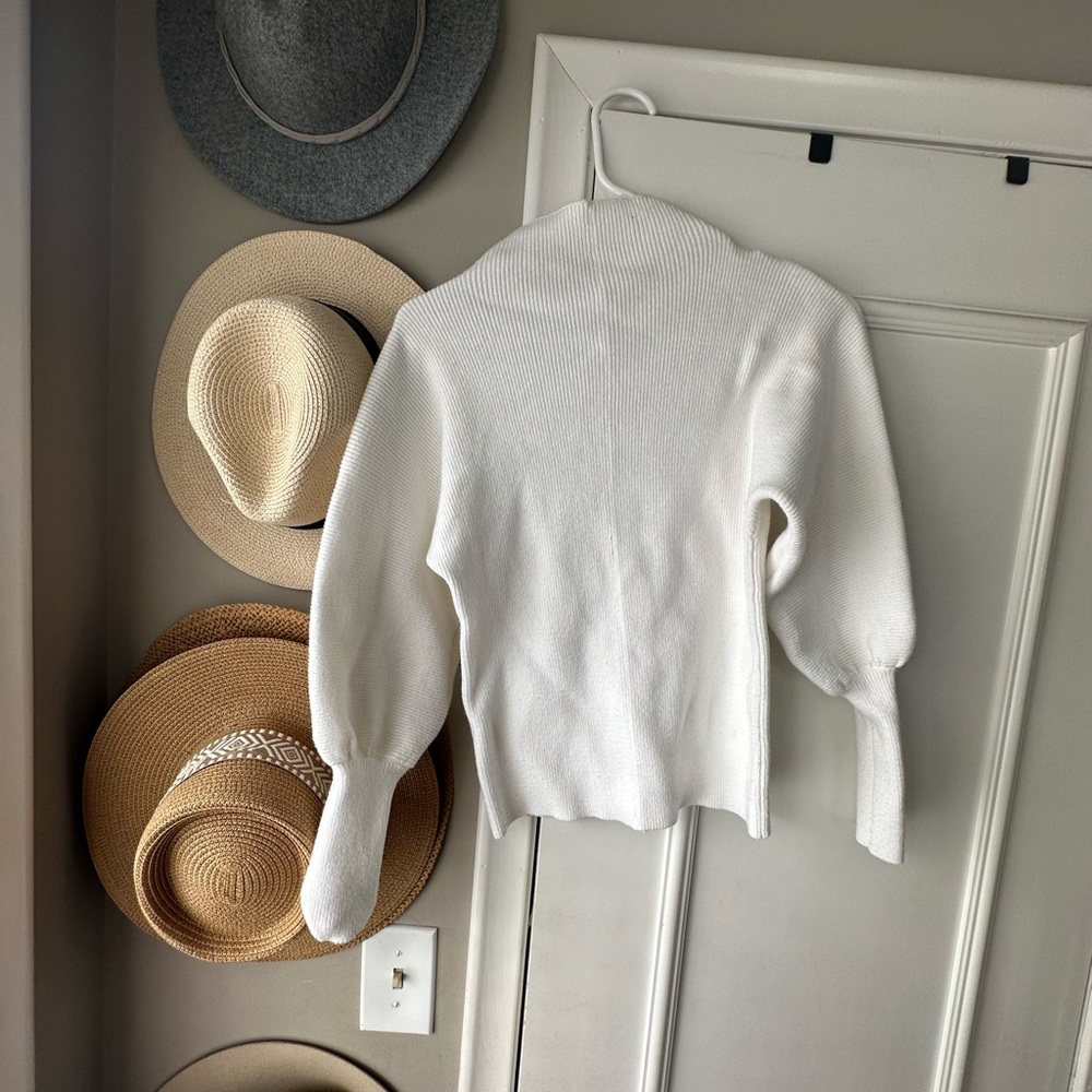 White colored sweater